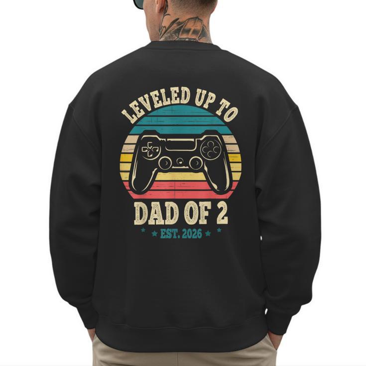 I Leveled Up To Dad Of 2 2026 Promoted To Dad Of Two Kids Men's Sweatshirt Back Print