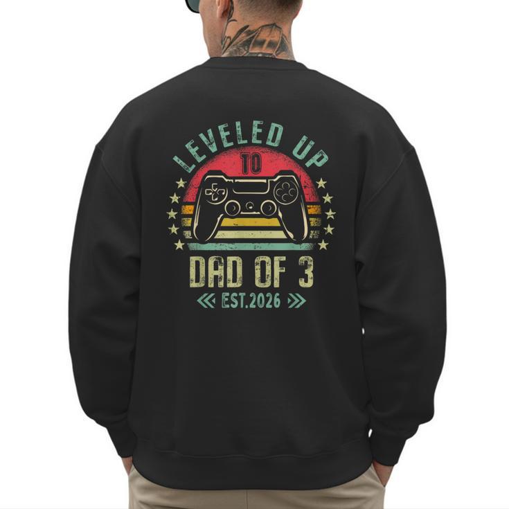 I Leveled Up To Dad Of 3 2026 Promoted To Dad Of Three Kids Men's Sweatshirt Back Print