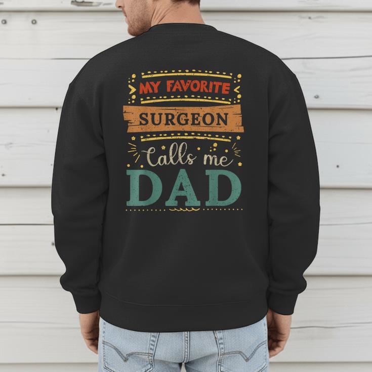 My Favorite Surgeon Calls Me Dad Surgeon Dad Men's Sweatshirt Back Print