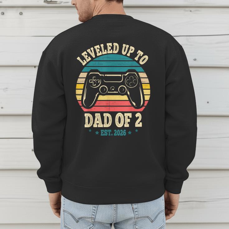 I Leveled Up To Dad Of 2 2026 Promoted To Dad Of Two Kids Men's Sweatshirt Back Print