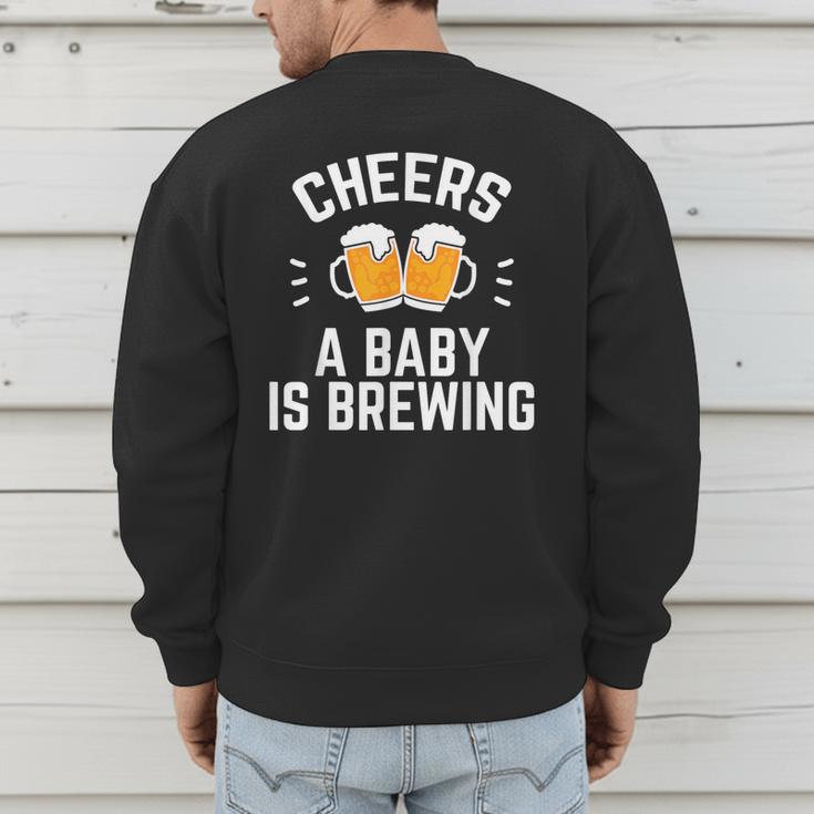 New Dad Baby Shower Cheers A Baby Is Brewing Men's Sweatshirt Back Print
