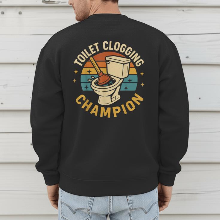 Toilet Clogging Champion Bathroom Humor Dad Jokes Men's Sweatshirt Back Print