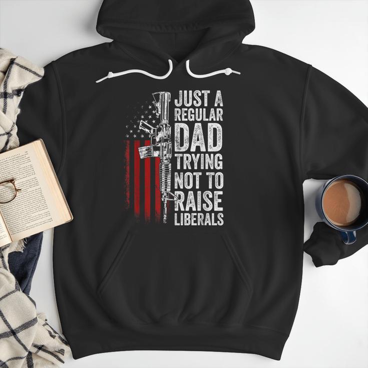 Just A Regular Dad Trying Not To Raise Liberals Father's Day Men Hoodie