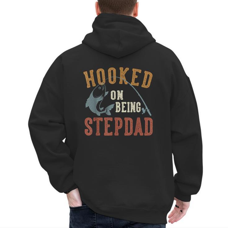 Hooked On Being Stepdad Father's Day Fishing Stepdad Men's Hoodie Back Print