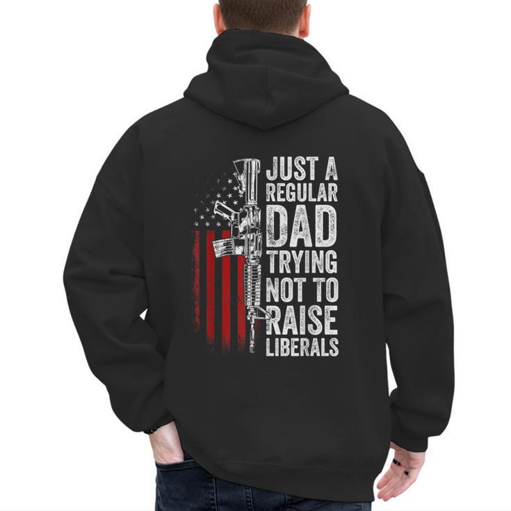 Just A Regular Dad Trying Not To Raise Liberals Father's Day Men's Hoodie Back Print