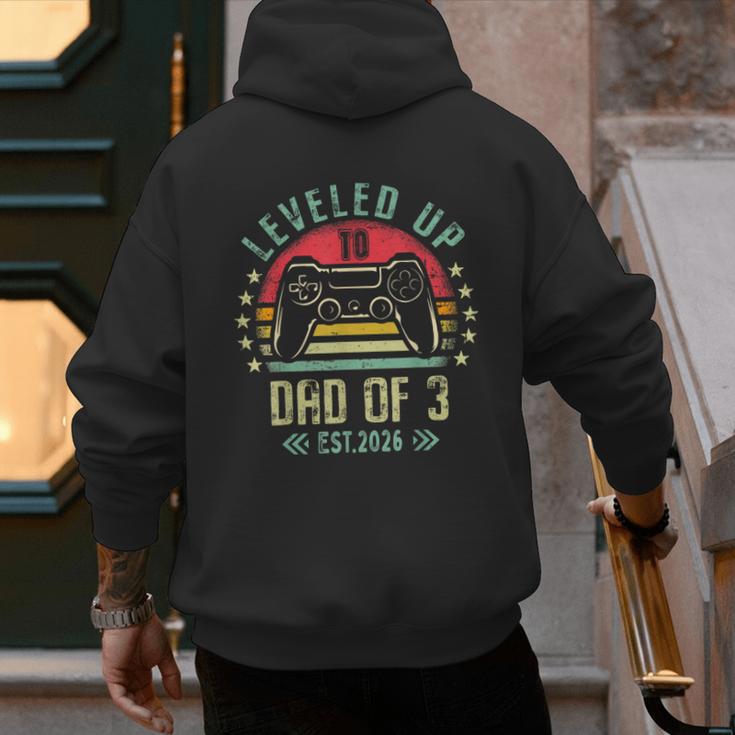 I Leveled Up To Dad Of 3 2026 Promoted To Dad Of Three Kids Men's Hoodie Back Print