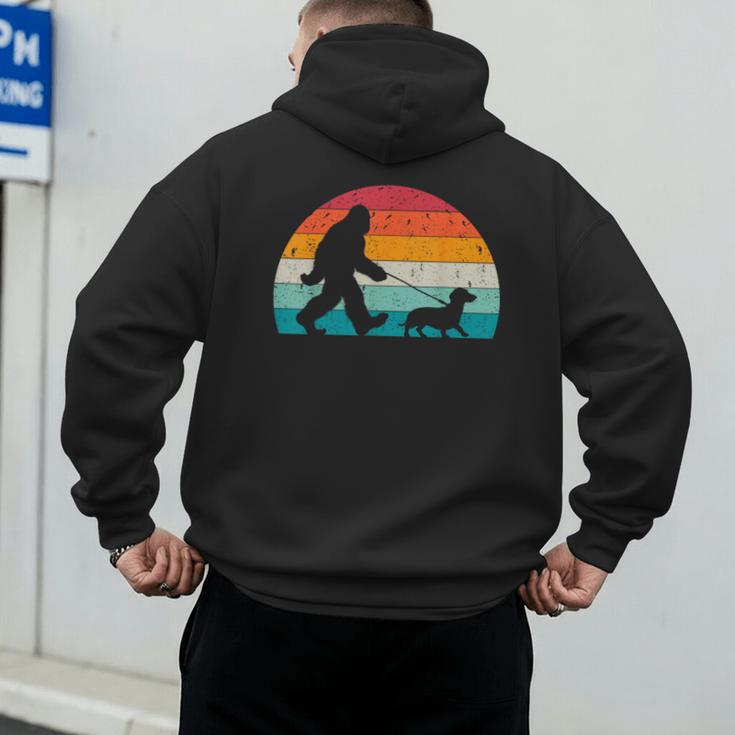Retro Sasquatch Lover Doxie Wiener Dog Walker Bigfoot Walking a Dog Dachshund Weiner Dog Dad Weenie Small Men's Hoodie Back Print