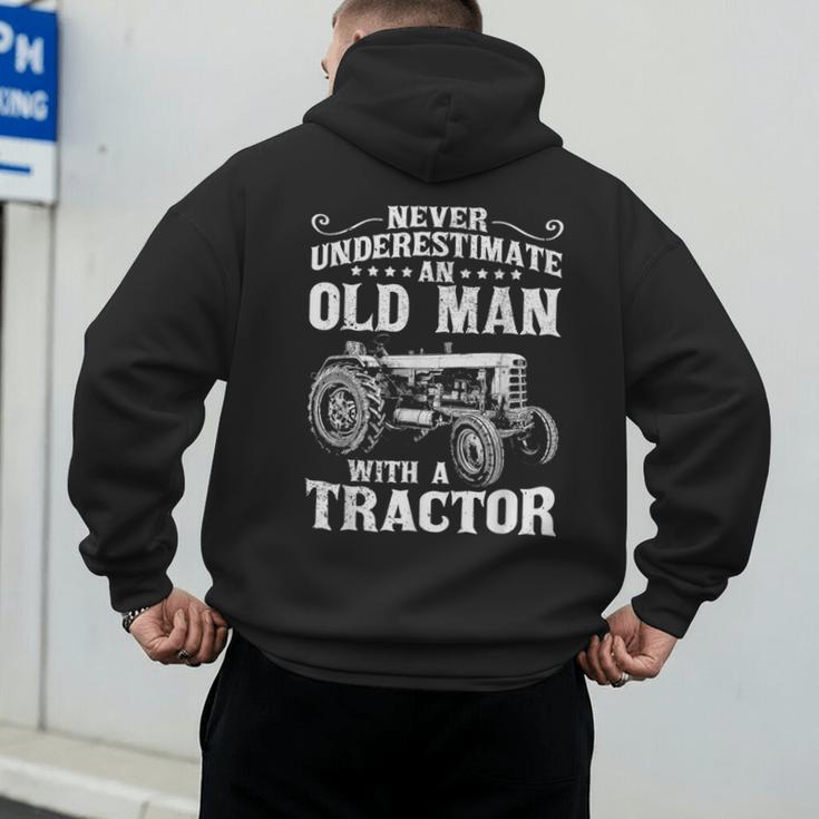 Never Underestimate An Old Man Tractor Farmer Dad Men's Hoodie Back Print