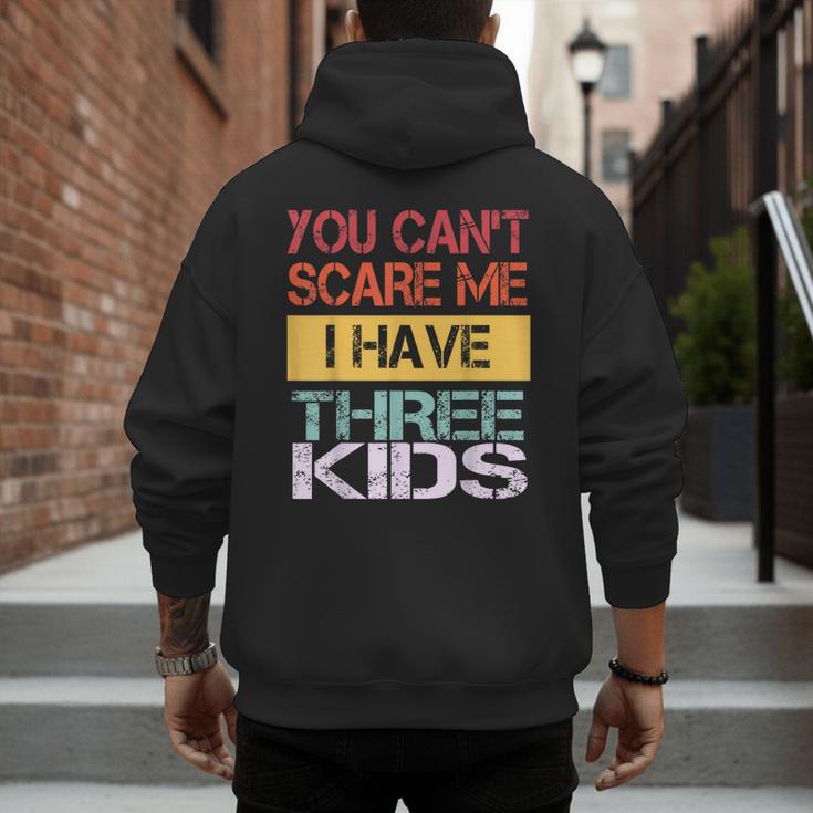 You Can't Scare Me I Have Three Kids Sons Mom Dad Joke Men's Hoodie Back Print