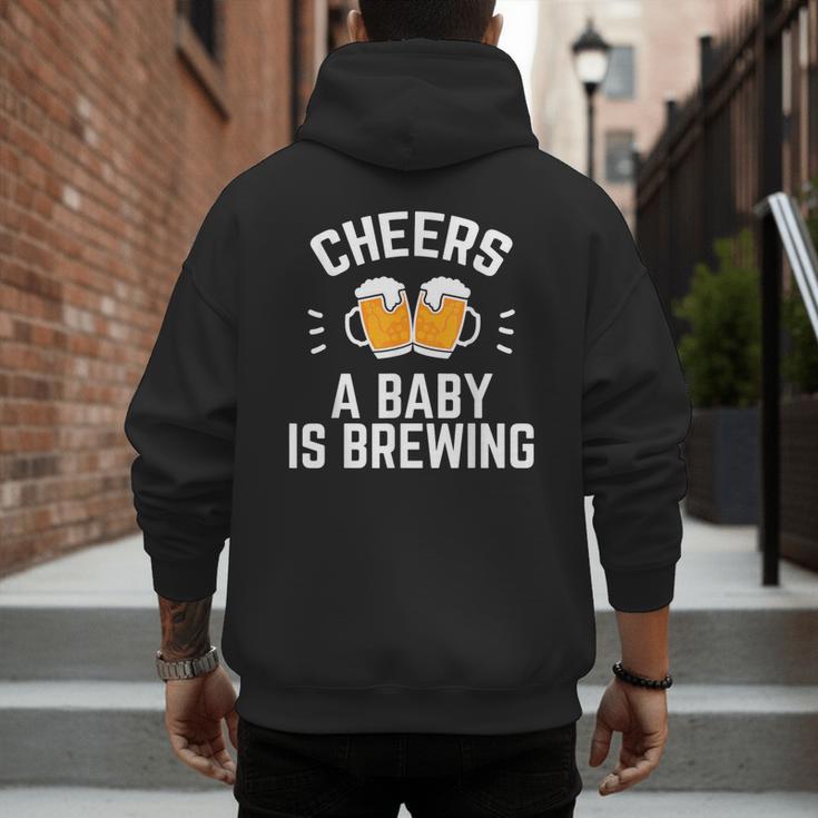 New Dad Baby Shower Cheers A Baby Is Brewing Men's Hoodie Back Print
