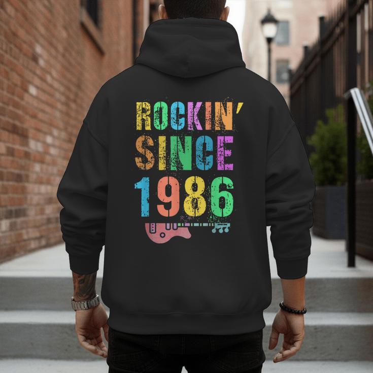 Rockin' Since 1986 Vintage Rockstar 40th Birthday Mom Dad 40 Men's Hoodie Back Print