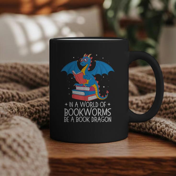 In A World Full Of Bookworms Be A Book Dragon Reading Graphic Print Coffee Mug