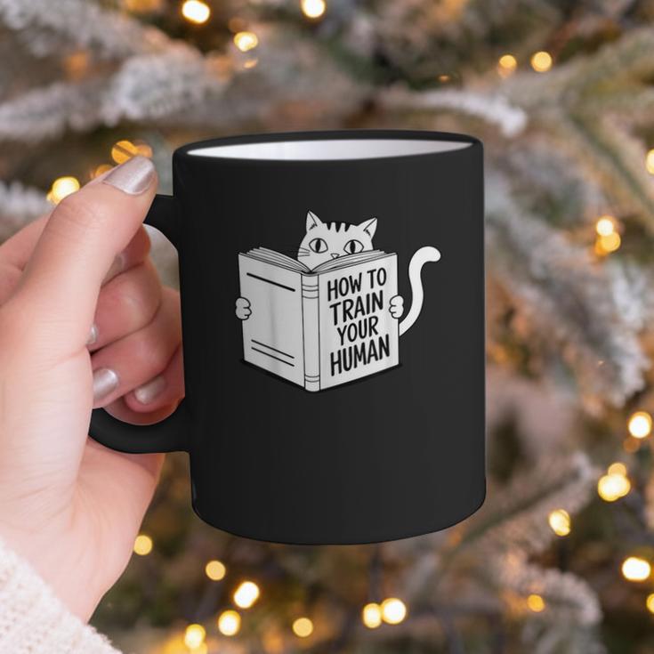 Cat Book Humor How To Train Your Human Graphic Print Coffee Mug Cat Book Humor How To Train Your Human Graphic Print Coffee Mug
