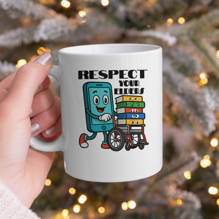 Respect Elders Cellphone Pushing Books In a Wheelchair Graphic Print Coffee Mug Respect Elders Cellphone Pushing Books In a Wheelchair Graphic Print Coffee Mug