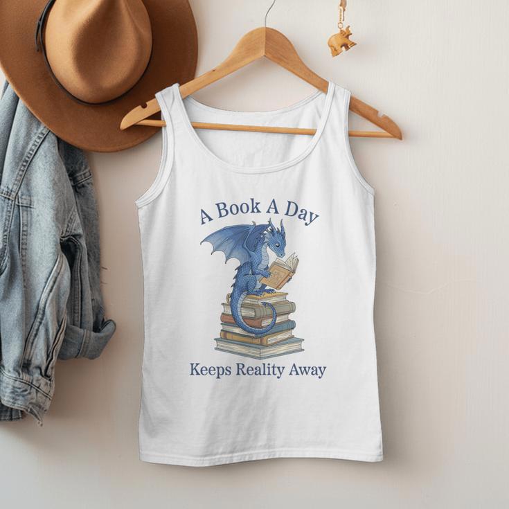 A Book A Day Keeps Reality Away Premium Tri-Blend Men Tank Top A Book A Day Keeps Reality Away Premium Tri-Blend Men Tank Top