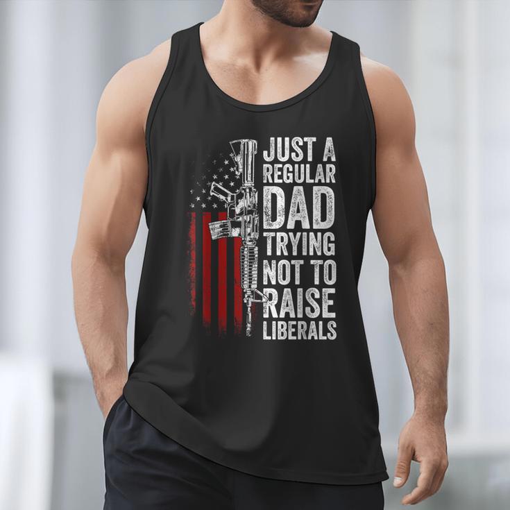 Just A Regular Dad Trying Not To Raise Liberals Father's Day Men Tank Top