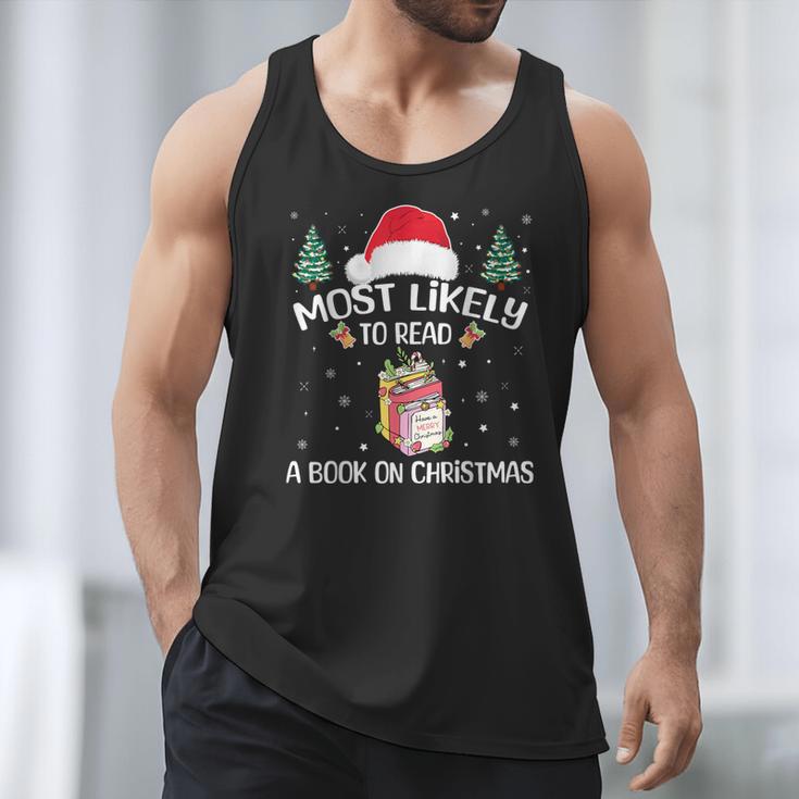 Most Likely To Read A Book On Christmas Love Reading Books Men Tank Top
