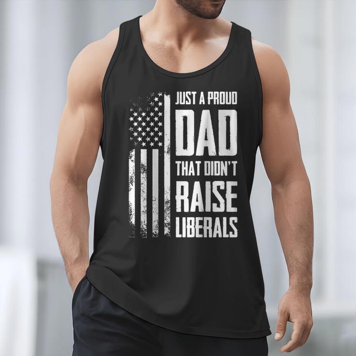 Proud Dad That Didn't Raise Liberals American Flag -ON BACK Women Men Men Tank Top