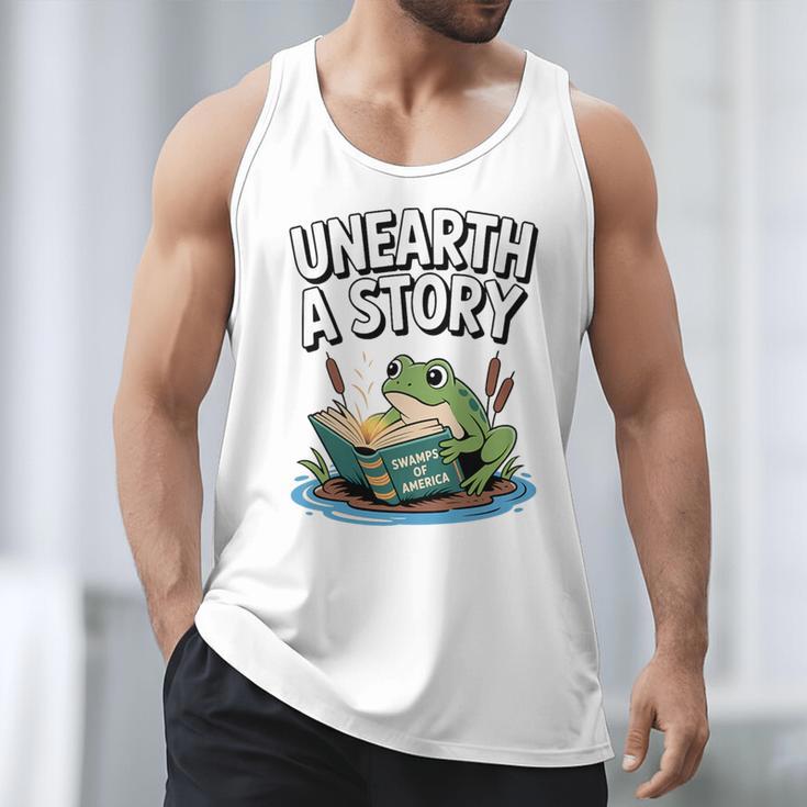 Unearth a Story Frog Reading a Book Summer 2026 Premium Tri-Blend Men Tank Top