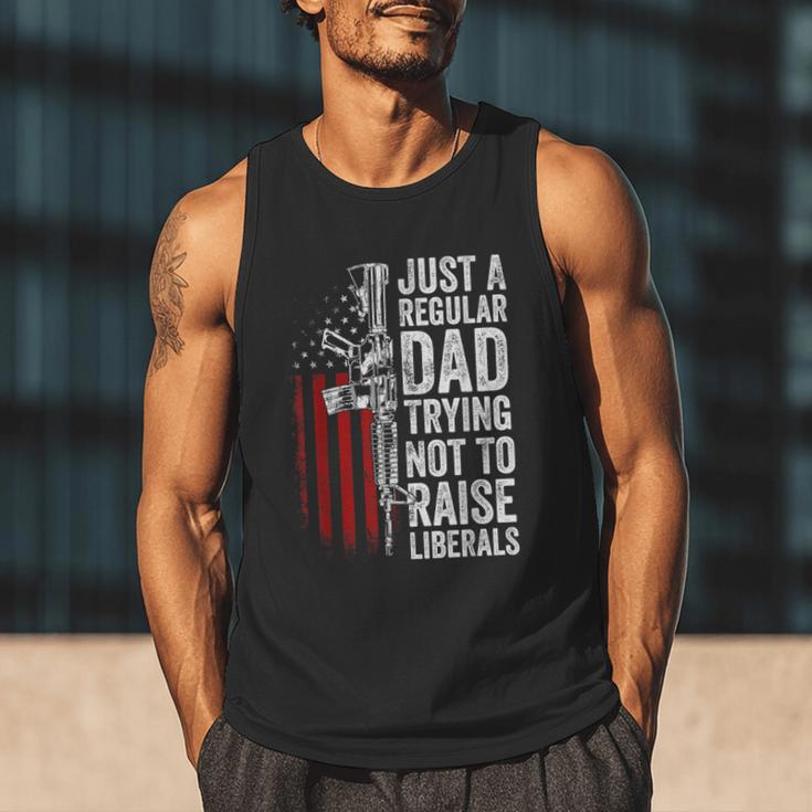 Just A Regular Dad Trying Not To Raise Liberals Father's Day Men Tank Top