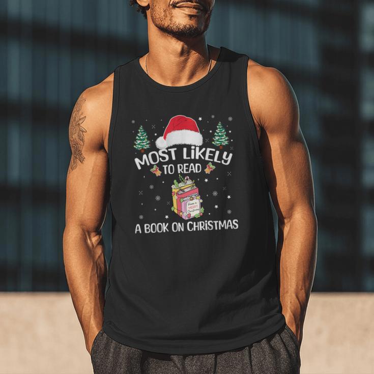 Most Likely To Read A Book On Christmas Love Reading Books Men Tank Top