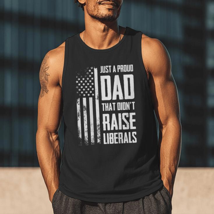 Proud Dad That Didn't Raise Liberals American Flag -ON BACK Women Men Men Tank Top