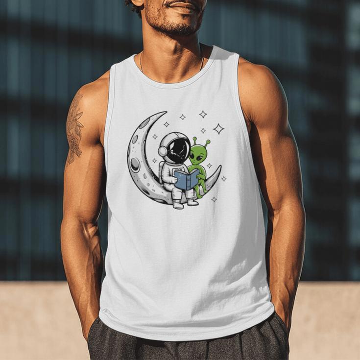 Astronaut Reading Book To Alien Moon Space Astronomy Men Tank Top