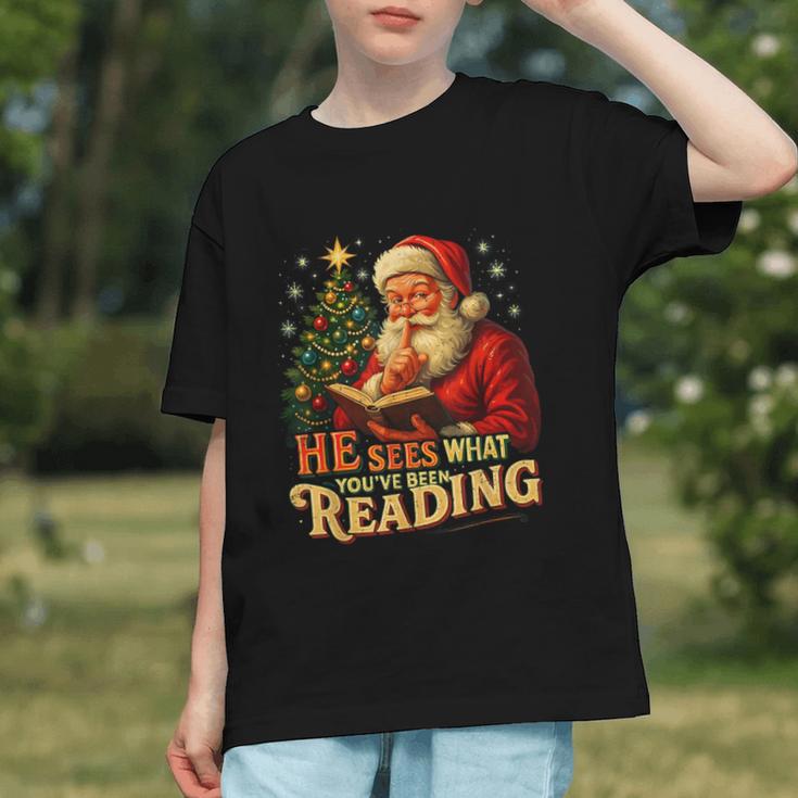 He Sees What You’Ve Been Reading Santa Book Lover Christmas Graphic Youth He Sees What You’Ve Been Reading Santa Book Lover Christmas Graphic Youth