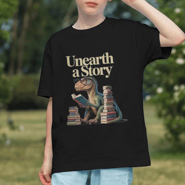 Unearth A Story Dinosaur Reading a Library Book Graphic Youth