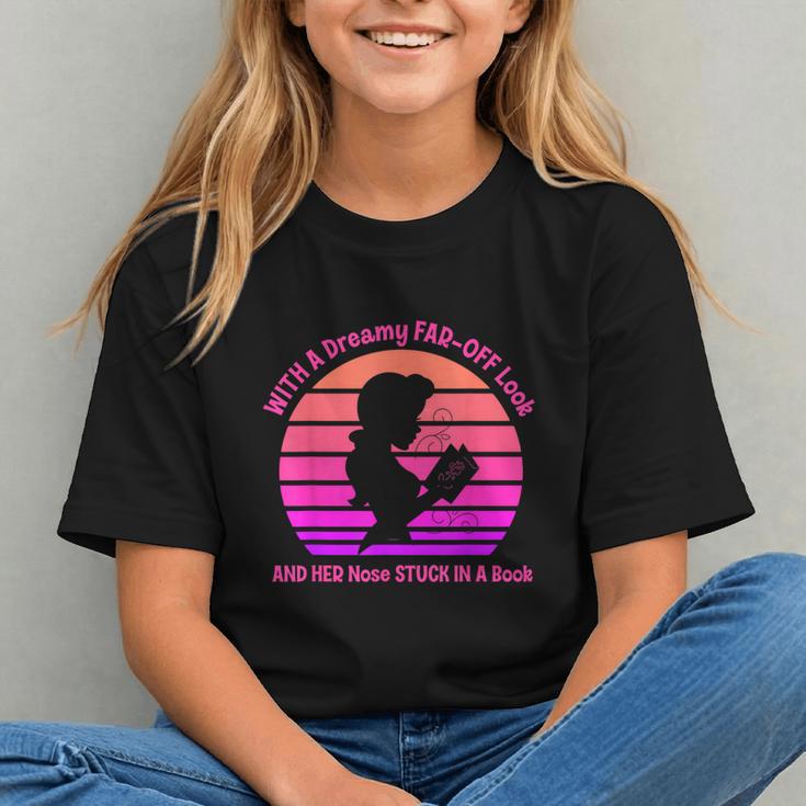 With A Dreamy Far-Off Look And Her Nose Stuck In A Book Graphic Youth