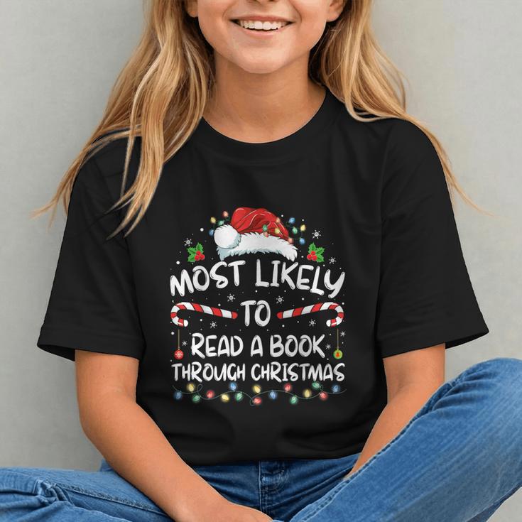 Most Likely To Read A Book Through Christmas Xmas Graphic Youth Most Likely To Read A Book Through Christmas Xmas Graphic Youth