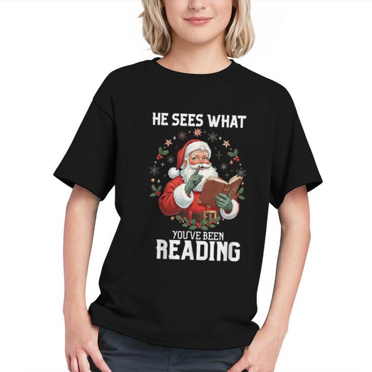 He Sees What You'Ve Been Reading Santa Book Lover Graphic Youth