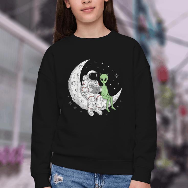 Astronaut Reading Book To Alien Moon Space Book Lover Men Youth Crewneck Sweatshirt