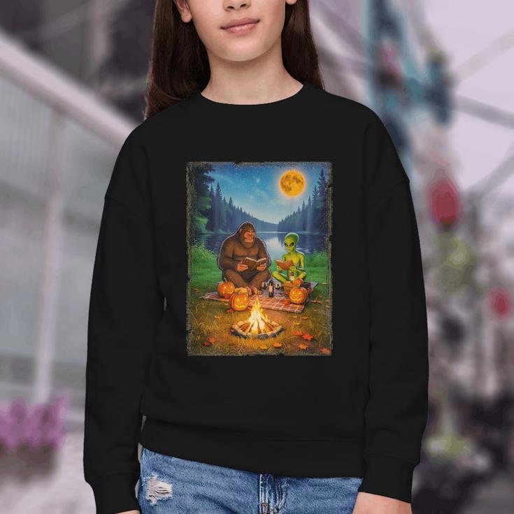 Bigfoot And Alien Reading Books Campfire Halloween Youth Crewneck Sweatshirt