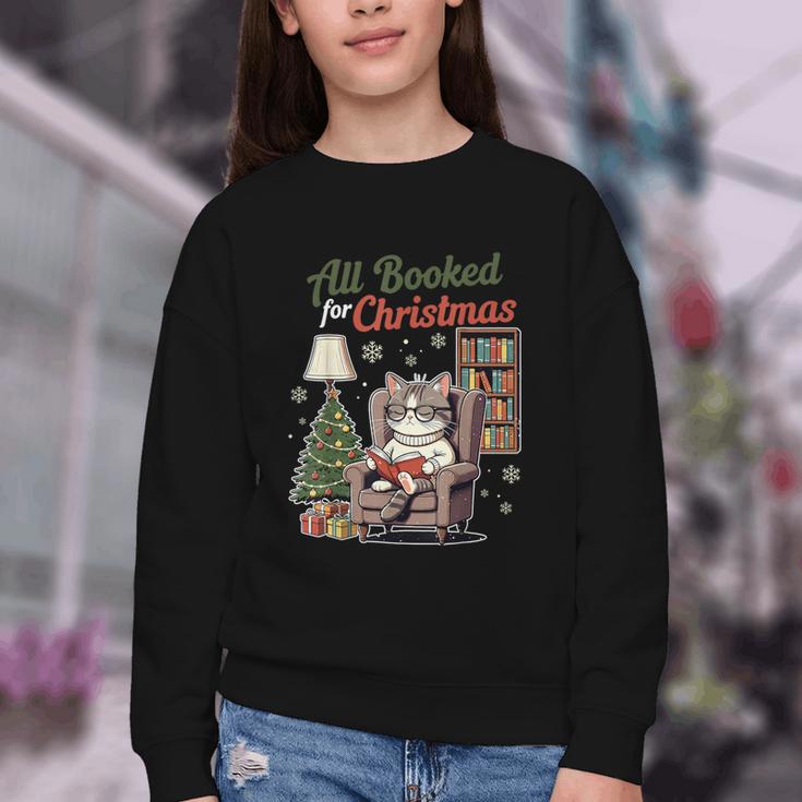 All Booked For Christmas Cute Bookish Cat Lover Youth Crewneck Sweatshirt