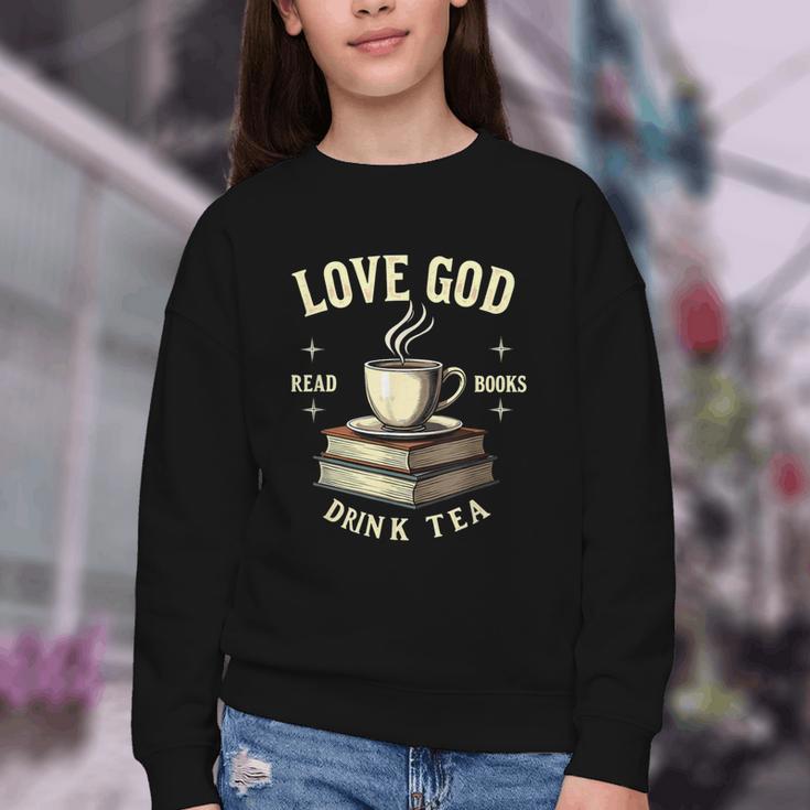 Christian Bookworm Love God Read Books Drink Tea Youth Crewneck Sweatshirt Christian Bookworm Love God Read Books Drink Tea Youth Crewneck Sweatshirt