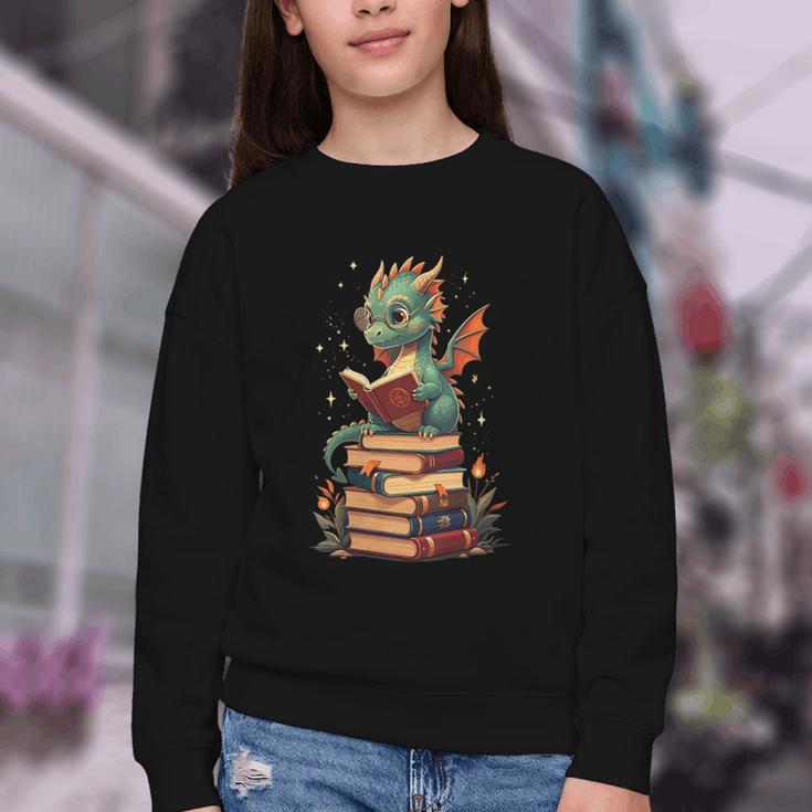 Cute Dragon Reading Book Bookworm Dragons And Books Youth Crewneck Sweatshirt Cute Dragon Reading Book Bookworm Dragons And Books Youth Crewneck Sweatshirt