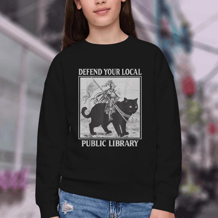 Defend Your Local Library Knight Cat Rider Book Lover Youth Crewneck Sweatshirt Defend Your Local Library Knight Cat Rider Book Lover Youth Crewneck Sweatshirt