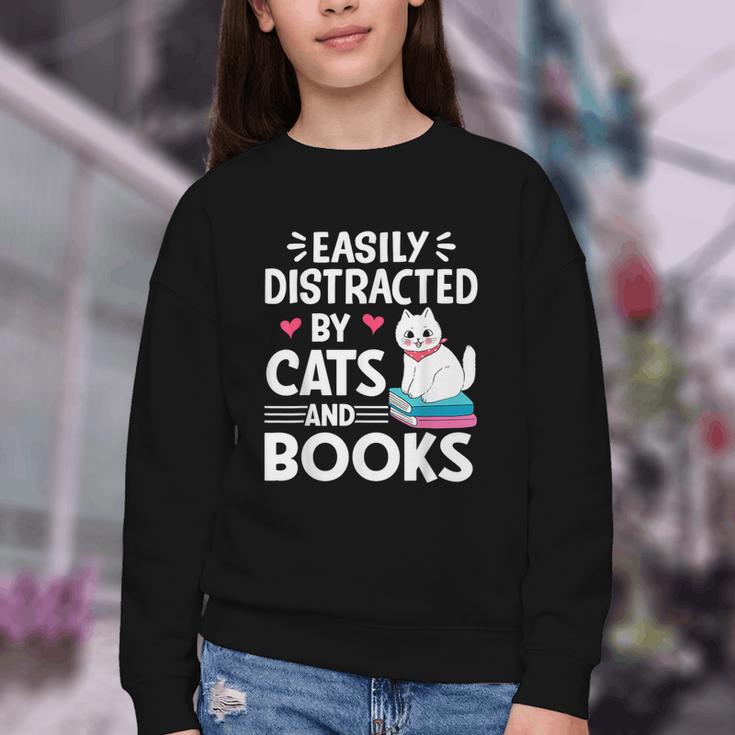 Easily Distracted By Cats And Books Cute Cat And Book Lovers Youth Crewneck Sweatshirt Easily Distracted By Cats And Books Cute Cat And Book Lovers Youth Crewneck Sweatshirt