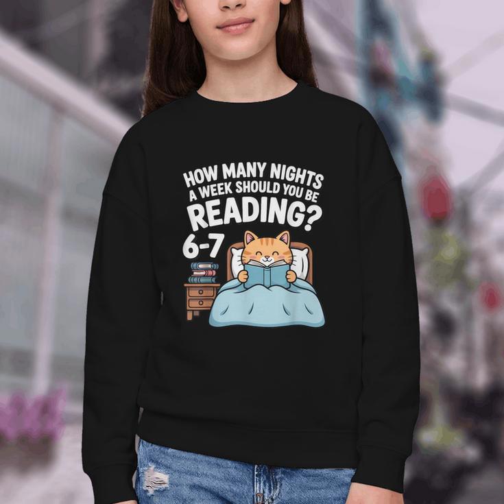 Orange Cat Reading Book 67 Six Seven Meme Youth Crewneck Sweatshirt