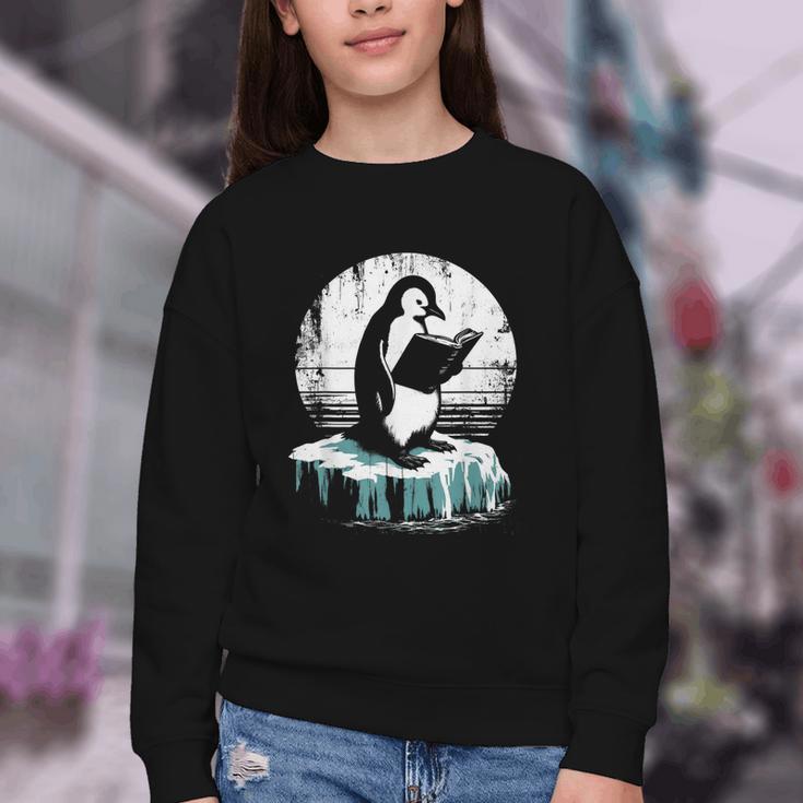 Penguin Reading A Book Vintage Graphic Bookworm Lover Youth Crewneck Sweatshirt Penguin Reading A Book Vintage Graphic Bookworm Lover Youth Crewneck Sweatshirt