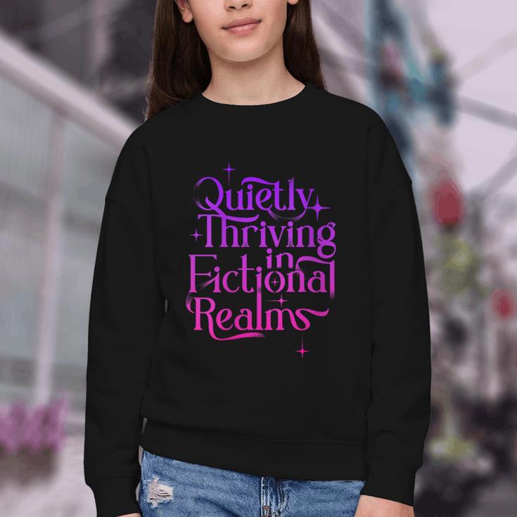 Quietly Thriving In Fictional Realms Book Lovers Youth Crewneck Sweatshirt Quietly Thriving In Fictional Realms Book Lovers Youth Crewneck Sweatshirt