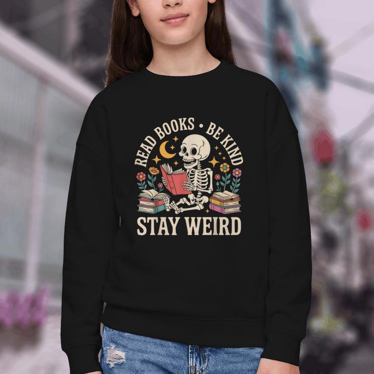 Read Books Be Kind Stay Weird Skeleton Reading Book Youth Crewneck Sweatshirt