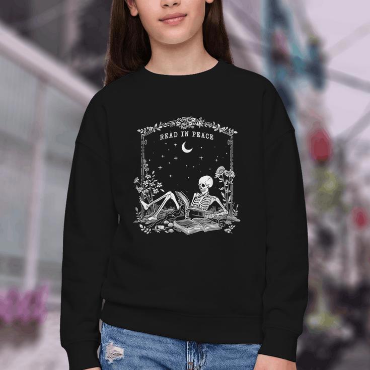 Read In Peace Skeleton Reading Book Halloween Bookish Youth Crewneck Sweatshirt Read In Peace Skeleton Reading Book Halloween Bookish Youth Crewneck Sweatshirt