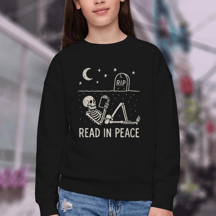 Skeleton Read In Peace Halloween Book Graphic Bookish Youth Crewneck Sweatshirt Skeleton Read In Peace Halloween Book Graphic Bookish Youth Crewneck Sweatshirt