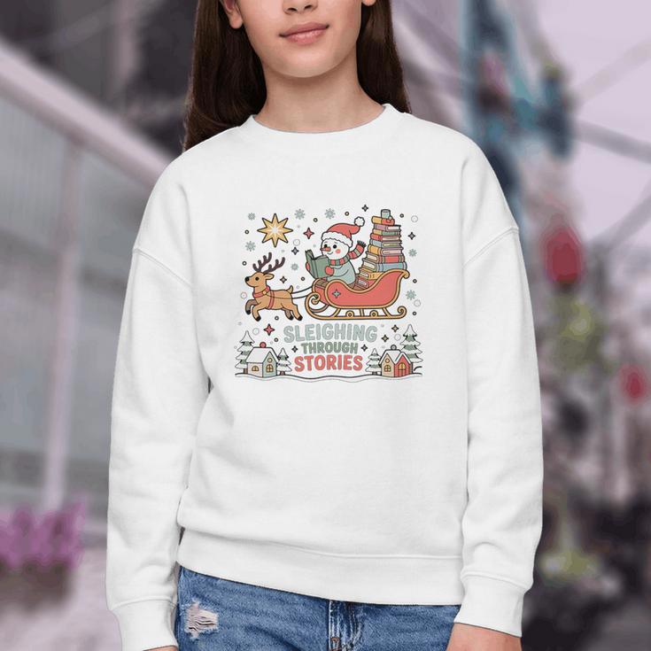 Book Lovers Winter Sleighing Through Stories Tee Premium Tri-Blend Youth Crewneck Sweatshirt