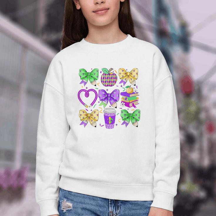 Mardi Gras Teacher Coquette Bow Pencil Apple Book Women Girl Youth Crewneck Sweatshirt Mardi Gras Teacher Coquette Bow Pencil Apple Book Women Girl Youth Crewneck Sweatshirt