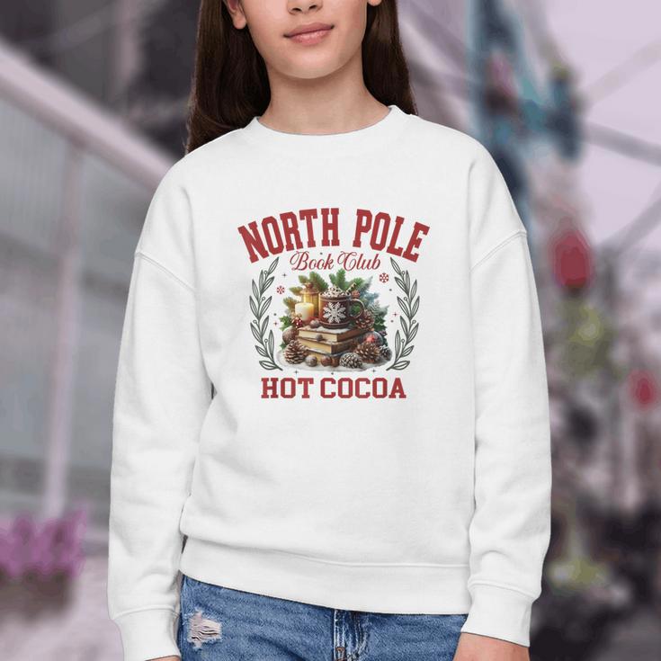 North Pole Book Club Hot Cocoa Bookworm Christmas Xmas Youth Crewneck Sweatshirt North Pole Book Club Hot Cocoa Bookworm Christmas Xmas Youth Crewneck Sweatshirt