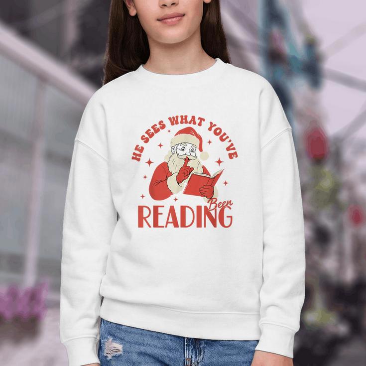 He Sees What You'Ve Been Reading Santa Book Youth Crewneck Sweatshirt