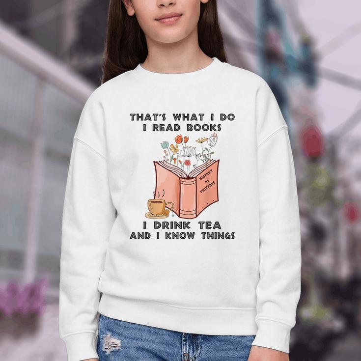 That's What I Do I Read Books I Drink Tea And I Know Things Youth Crewneck Sweatshirt